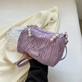 Minimalist lavender pleated shoulder bag with pearl chain detail and crossbody strap - Purple