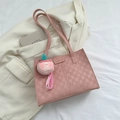 Pink checkered tote bag with plush peach charm and FASHION logo on a soft background - With Ornament / Pink