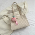 Creamy beige quilted tote bag with checkered texture and pink fuzzy ball charm - With Ornament / White