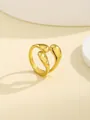 Detail shot of golden liquid metal nail ring with mirror finish on white geometric stand - Gold Organic Waterdrop Wrap Style (RN175-G6)