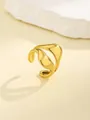 Detail showing elegant gold irregular wave ring on a natural stone prop background - Gold Irregular Wave Style (RN175-G1)
