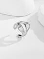 Macro shot of silver fluid-style open ring with polished wavy lines on abstract blocks - Silver Irregular Wave Style (RN175-S1)