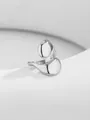 Macro view of polished silver irregular open ring with glossy metallic droplet ends - Silver Irregular Waterdrop Open Style (RN175-S5)