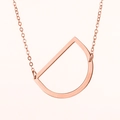 Collar minimalista de acero inoxidable oro rosa con un colgante hueco de la letra D - Oro Rosa D