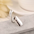 Macro side view of polished silver nail ring showing glossy finish and open-back structure - Silver