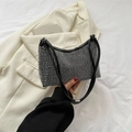 Sparkling silver rhinestone saddle bag with black leather handle in variant black colorway - Silver