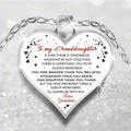 Macro shot of silver heart pendant with To My Granddaughter engraving and shiny background - Silver (To My Granddaughter)