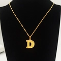 Detail of 18K gold plated letter D pendant with textured grid on water wave chain - Capital Letter D