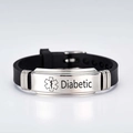 Close-up of black silicone medical alert bracelet with stainless steel Diabetic engraving - Silver / Diabetic