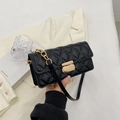 Chic black quilted crossbody bag with gold rectangular clasp and chain strap - Black