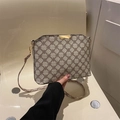 Borsa a tracolla vintage con stampa a quadrifoglio e fibbia in metallo dorato in beige - Cachi