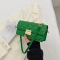 Green quilted flap crossbody bag with golden rectangular clasp and chain strap detail - Green