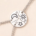 Detail of three-piece silver puzzle pendant necklace with sun moon star sun and rhinestones - Three Piece Puzzle Necklace (XL358-S) / Silver