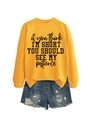 Flat lay of yellow long sleeve sweatshirt with humor text and ripped blue denim shorts - Yellow (Black Text)