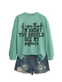 Detail of mint green sweatshirt with humor slogan and distressed denim shorts set - Light Green (Black Print)
