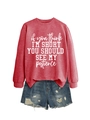 Detail view of red letter print sweatshirt paired with distressed denim shorts on white - Red (White Font)