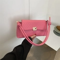 Chic pink quilted rectangular crossbody bag with gold buckle and knotted strap detail - Pink