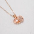 Rose gold seashell necklace with sparkling rhinestones and a white pearl pendant - Rose Gold