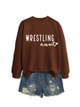 Detail of a brown crewneck sweatshirt featuring Wrestling Aunt text and denim shorts - Coffee Sweatshirt (White Font)