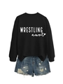 Detail of a black Wrestling Aunt sweatshirt paired with distressed blue denim shorts - Black Sweatshirt (White Font)