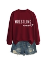 Flat lay of burgundy wrestling aunt sweatshirt paired with distressed denim shorts set - Wine Red Sweatshirt (White Font)
