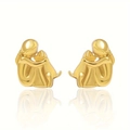 Polished gold stud earrings featuring a minimalist girl hugging dog silhouette design - Gold Stud Earrings