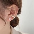 Elegant mermaid tail pearl earrings with micro-inlaid diamonds shown on a model - Gold Fish Tail Pearl Style (Style 1)