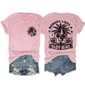Detailed view of pink T-shirt featuring Nobody Likes A Shady Beach print and denim shorts - Pink (Black Graphic)