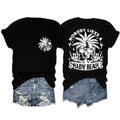 Detail of black T-shirt with 'Nobody likes a shady beach' graphic and denim shorts - Black (White Graphic)