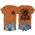Detailed back view of orange cotton t-shirt with tropical skull graphic and denim shorts - Burnt Orange (Black Graphic)