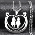 Detail of horseshoe heart pendant necklace with double equestrian riders on box chain - Silver