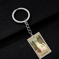 Detail showing The Empress tarot cat design on polished stainless steel keychain - THE EMPRESS