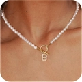 Detail of high-luster pearl necklace with gold OT buckle and pavé rhinestone letter B pendant - Gold B