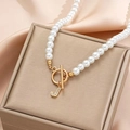 Lustrous pearl necklace featuring a gold OT buckle and diamond-encrusted letter J pendant - Gold J