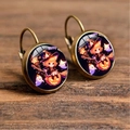 Close-up of Halloween drop earrings featuring anime girl on pumpkin with ghosts - Chibi Fox Ear Witch Hat Girl with Pumpkin (Style-24)