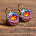 Macro detail of Halloween hook earrings featuring glowing pumpkin art on wood - Dark Forest Glowing Pumpkin Lantern (Style-19)