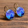 Close-up of vintage bronze Halloween earrings featuring cute ghost illustrations - Blue-Violet Cartoon Little Ghost (Style-18)
