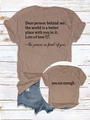 Close-up of inspirational quotes printed on the back of a taupe casual short sleeve T-shirt - Light Coffee (Black Font)