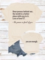 Detail showing 'you are enough' slogan and heart print on apricot cotton t-shirt - Apricot (Black Print)