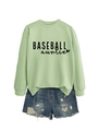 Detail of light green baseball auntie sweatshirt paired with distressed denim shorts - Olive Green Sweatshirt (Black Font)