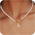Lustrous white pearl necklace with golden OT clasp and diamond-encrusted letter N pendant - Gold N