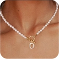 Elegant pearl necklace with gold OT clasp and sparkling rhinestone initial O pendant - Gold O