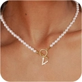 Lustrous white pearl necklace featuring a gold OT buckle and sparkling pavé V pendant - Gold V