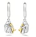 Two-tone silver and gold hug girl and dog stud earrings with polished metal finish - Two-Tone Hoop Earrings