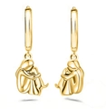 Golden hoop earrings with abstract girl hugging dog charm and polished finish - Gold Earrings