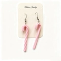 Detail of cute pink and white striped candy cane drop earrings on a jewelry card - Pink and White Striped Style
