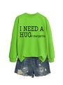 Detail of neon green sweatshirt with I NEED A HUGE margarita text and ripped denim shorts - S / Black Font / Fluorescent Green