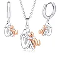 Girl hugging pet cat pendant necklace and earrings set in two-tone silver and gold finish - Silver and Rose Gold Cat Jewelry Set