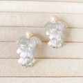 Elegant silver brushed layered petal earrings featuring soft pink freshwater pearls - Triple Layer
