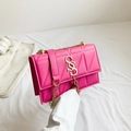 Hot pink chain shoulder bag with triangle quilting and gold tassel logo detail - Rose Red